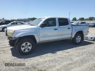 2007 Toyota Tacoma PreRunner with VIN 3TMJU62N77M028907, listed as a Copart auction lot 59622695 with 186,339 mi miles and Salvage title. Bid and sale history available at DreamBid. Image 1.