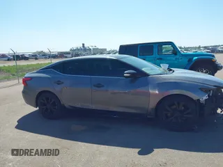 2018 Nissan Maxima SL with VIN 1N4AA6AP9JC360485, listed as a IAAI auction lot 42206521 with 140,898 mi miles and . Bid and sale history available at DreamBid. Image 13.