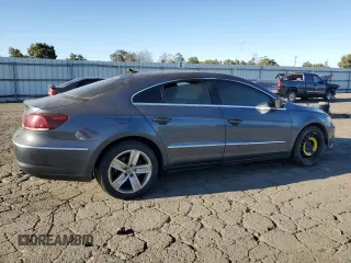 2013 Volkswagen CC Sport with VIN WVWBP7ANXDE525051, listed as a Copart auction lot 70659744 with 293,611 mi miles and Salvage Title. Bid and sale history available at DreamBid. Image 3.
