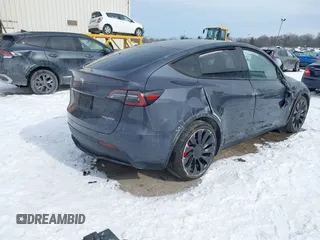 2023 Tesla Model Y Performance with VIN 7SAYGDEF0PF898181, listed as a IAAI auction lot 41577666 with 19,051 mi miles and . Bid and sale history available at DreamBid. Image 4.