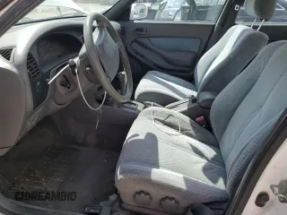 1994 Toyota Camry LE z VIN JT2SK12E0R0256694, wystawiony jako Copart lot #52819245 z przebiegiem 182 566 mil mil oraz Szkoda całkowita • Salvage title. Historia ofert i sprzedaży dostępna na DreamBid. Obrazek 7.