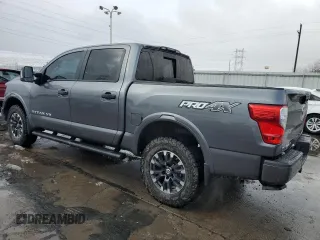 2018 Nissan Titan Pro-4X z VIN 1N6AA1E51JN536680, wystawiony jako Copart lot #82361724 z przebiegiem 98 699 mil mil oraz Szkoda całkowita • Salvage title. Historia ofert i sprzedaży dostępna na DreamBid. Obrazek 2.