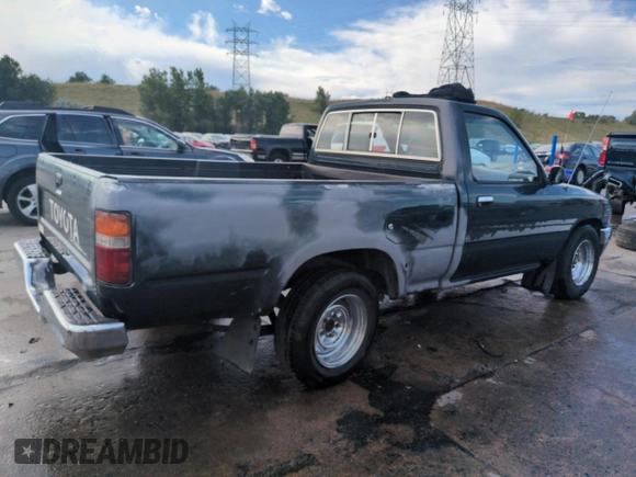 1994 Toyota Pickup DX with VIN JT4RN81PXR5174113, listed as a Copart auction lot 64211905 with 209,694 mi miles and Salvage title. Bid and sale history available at DreamBid. Image 3.