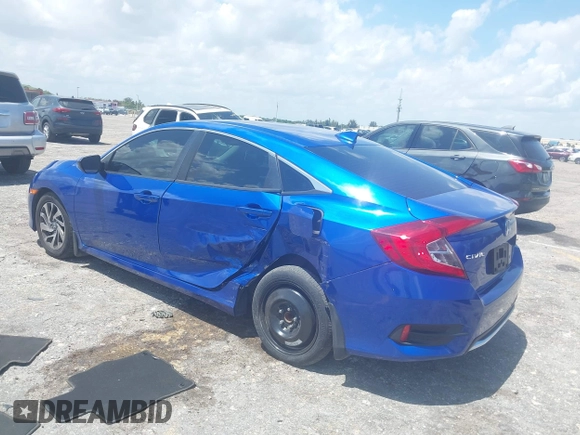 2018 Honda Civic EX with VIN 19XFC2F72JE036055, listed as a IAAI auction lot 41960037 with 128,650 mi miles and . Bid and sale history available at DreamBid. Image 3.