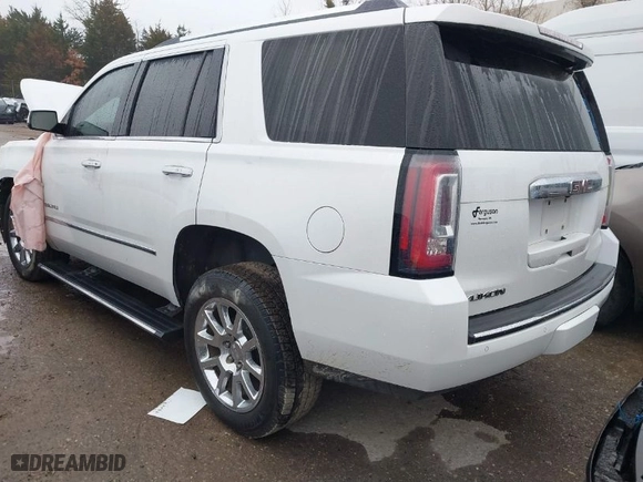 2016 GMC Yukon Denali with VIN 1GKS2CKJ1GR299065, listed as a IAAI auction lot 41513618 with 111,043 mi miles. Bid and sale history available at carsss.com. Image 3.