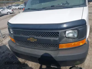 2014 Chevrolet Express Cargo Van with VIN 1GCWGFCA8E1199409, listed as a IAAI auction lot 41936092 with 304,367 mi miles. Bid and sale history available at carsss.com. Image 6.