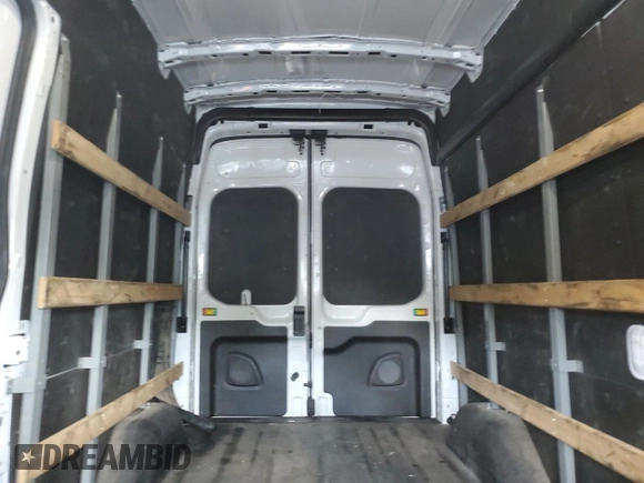 2021 Ford Transit Cargo z VIN 1FTBR1X82MKA08353, wystawiony jako Copart lot #58431105 z przebiegiem 100 195 mil mil oraz Szkoda całkowita • Salvage title. Historia ofert i sprzedaży dostępna na DreamBid. Obrazek 11.