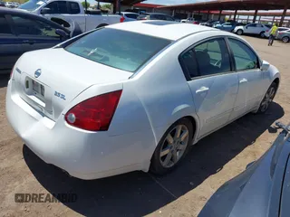2004 Nissan Maxima SE with VIN 1N4BA41E44C882288, listed as a IAAI auction lot 42047495 with 323,753 mi miles. Bid and sale history available at carsss.com. Image 4.