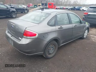 2009 Ford Focus S with VIN 1FAHP34N39W151811, listed as a IAAI auction lot 41911138 with 125,325 mi miles. Bid and sale history available at carsss.com. Image 4.