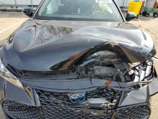 2021 Toyota Avalon Hybrid XSE z VIN 4T1EA1AB9MU007869, wystawiony jako Copart lot #66118102 z przebiegiem 18 195 mil mil oraz . Historia ofert i sprzedaży dostępna na DreamBid. Obrazek 7.