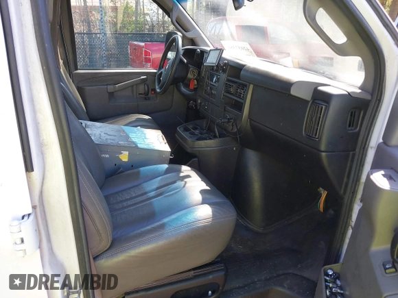 2017 Chevrolet Express Cargo Van with VIN 1GCWGAFF2H1133906, listed as a IAAI auction lot 42037388 with 218,601 mi miles. Bid and sale history available at carsss.com. Image 5.