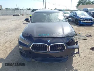 2018 BMW X2 xDrive28i z VIN WBXYJ5C37JEF71272, wystawiony jako IAAI lot #42073863 z przebiegiem 94 947 mil mil oraz . Historia ofert i sprzedaży dostępna na DreamBid. Obrazek 12.
