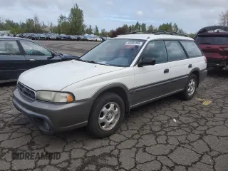 1996 Subaru Legacy Outback with VIN 4S3BG6850T7971454, listed as a Copart auction lot 52082395 with 173,542 mi miles and Salvage title. Bid and sale history available at DreamBid. Image 1.