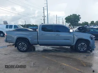 2020 Toyota Tacoma SR5 with VIN 3TMDZ5BN3LM080702, listed as a IAAI auction lot 42463811 with 70,185 mi miles and . Bid and sale history available at DreamBid. Image 13.
