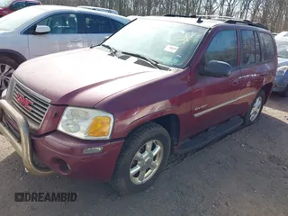 2006 GMC Envoy SLT with VIN 1GKDT13S362145045, listed as a IAAI auction lot 41916115 with Not Provided miles and . Bid and sale history available at DreamBid. Image 2.