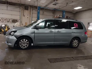 2008 Honda Odyssey EX-L with VIN 5FNRL38738B030818, listed as a IAAI auction lot 41718717 with 247,994 mi miles and . Bid and sale history available at DreamBid. Image 14.
