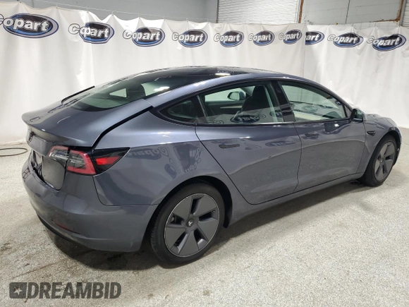 2022 Tesla Model 3 with VIN 5YJ3E1EA8NF287506, listed as a Copart auction lot 55674145 with 106,745 mi miles and Clean Title. Bid and sale history available at DreamBid. Image 3.