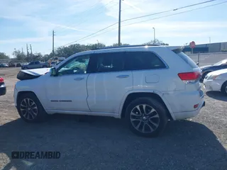 2017 Jeep Grand Cherokee Overland z VIN 1C4RJECG5HC959981, wystawiony jako IAAI lot #41638958 z przebiegiem 102 122 mil mil oraz . Historia ofert i sprzedaży dostępna na DreamBid. Obrazek 14.
