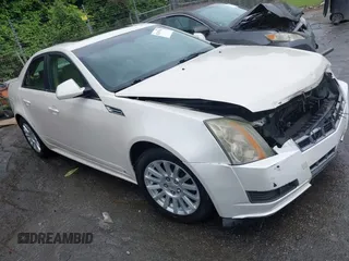 2012 Cadillac CTS Luxury with VIN 1G6DE5E55C0111056, listed as a IAAI auction lot 42367478 with 103,392 mi miles and . Bid and sale history available at DreamBid. Image 1.