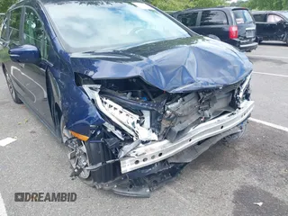 2022 Honda Odyssey EX-L with VIN 5FNRL6H70NB053843, listed as a IAAI auction lot 40210685 with 21,571 mi miles and . Bid and sale history available at DreamBid. Image 6.