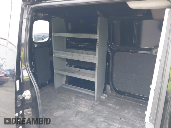 2015 Nissan NV200 S with VIN 3N6CM0KN3FK712950, listed as a IAAI auction lot 41724321 with 117,089 mi miles and . Bid and sale history available at DreamBid. Image 8.