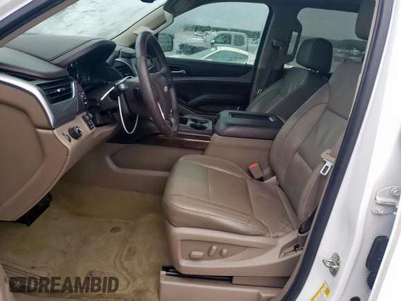 2016 Chevrolet Tahoe LT with VIN 1GNSCBKC2GR475679, listed as a Copart auction lot 54987195 with 130,387 mi miles and Salvage title. Bid and sale history available at DreamBid. Image 7.