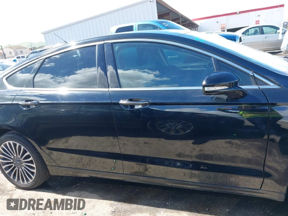2017 Ford Fusion Titanium with VIN 3FA6P0SU0HR277268, listed as a IAAI auction lot 41798990 with 140,452 mi miles and . Bid and sale history available at DreamBid. Image 14.