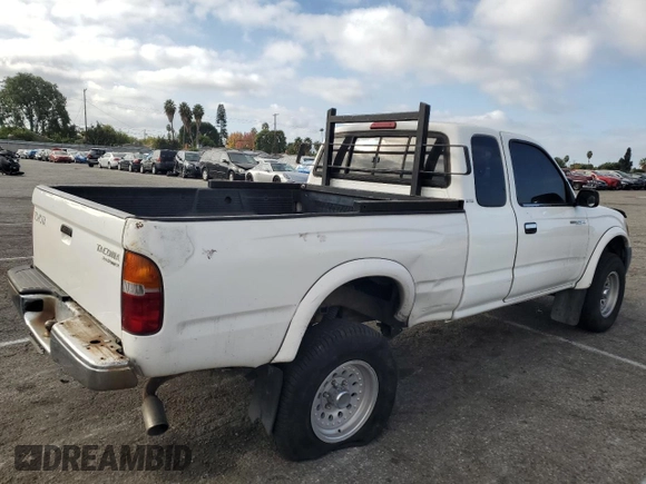 1999 Toyota Tacoma PreRunner with VIN 4TASM92NXXZ476400, listed as a Copart auction lot 81001204 with 280,797 mi miles and Salvage title. Bid and sale history available at DreamBid. Image 3.
