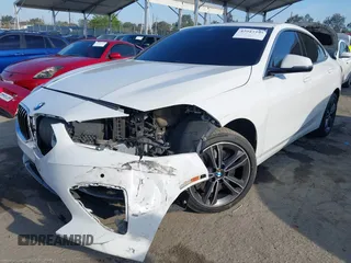 2021 BMW 2 Series 228i with VIN WBA53AK09M7H30650, listed as a IAAI auction lot 42043390 with 89,611 mi miles and . Bid and sale history available at DreamBid. Image 2.