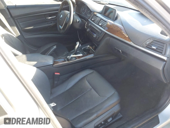 2015 BMW 3 Series 328i with VIN WBA3A5C57FF609054, listed as a IAAI auction lot 41330498 with 129,378 mi miles. Bid and sale history available at carsss.com. Image 5.