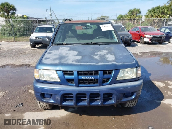 2004 Isuzu Rodeo S with VIN 4S2CK58W944317209, listed as a IAAI auction lot 41498160 with 114,764 mi miles and . Bid and sale history available at DreamBid. Image 6.