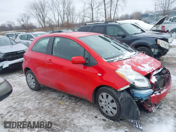 2011 Toyota Yaris with VIN JTDJT4K34B5329980, listed as a IAAI auction lot 41393540 with 84,987 mi miles. Bid and sale history available at carsss.com. Image 14.