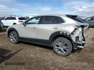 2022 Mazda CX-30 S Premium with VIN 3MVDMBDL4NM447276, listed as a Copart auction lot 47527985 with 4,577 mi miles and Salvage Title. Bid and sale history available at carsss.com. Image 2.