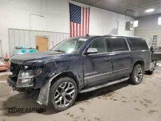 2017 Chevrolet Suburban Premier with VIN 1GNSKJKC8HR199992, listed as a Copart auction lot 45502355 with 219,534 mi miles and Salvage Title. Bid and sale history available at DreamBid. Image 1.