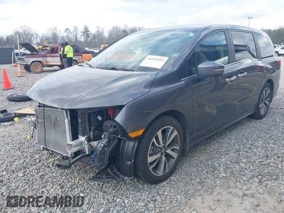 2023 Honda Odyssey Touring with VIN 5FNRL6H86PB065670, listed as a IAAI auction lot 41691093 with 22,518 mi miles and . Bid and sale history available at DreamBid. Image 19.