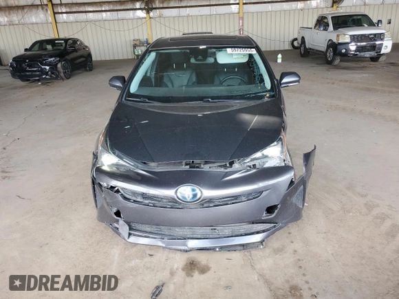 2017 Toyota Prius Two with VIN JTDKARFU9H3049566, listed as a Copart auction lot 60554675 with 129,231 mi miles and Salvage title. Bid and sale history available at DreamBid. Image 5.
