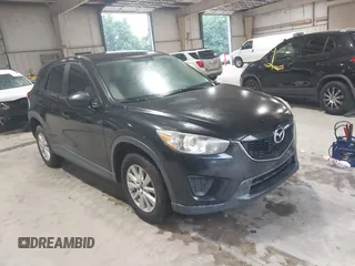 2013 Mazda CX-5 Sport with VIN JM3KE2BE3D0168842, listed as a IAAI auction lot 42653618 with 256,392 mi miles and . Bid and sale history available at DreamBid. Image 1.