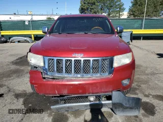 2011 Jeep Grand Cherokee Overland with VIN 1J4RR6GT8BC606688, listed as a Copart auction lot 57182295 with 100,423 mi miles and Salvage title. Bid and sale history available at DreamBid. Image 5.