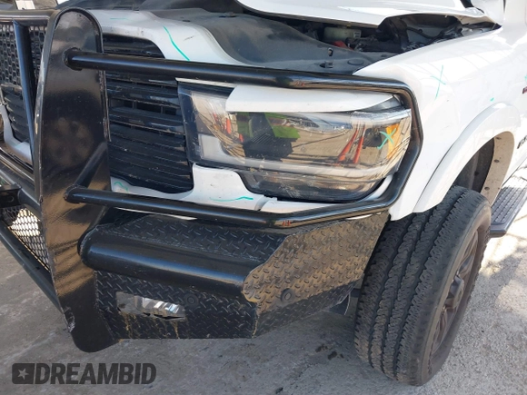 2021 Ram 2500 Laramie with VIN 3C6UR5NLXMG677847, listed as a IAAI auction lot 40992410 with 106,912 mi miles. Bid and sale history available at carsss.com. Image 6.