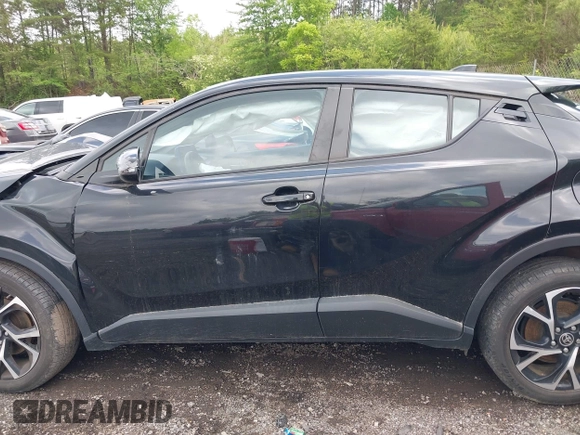 2022 Toyota C-HR XLE with VIN NMTKHMBX9NR142398, listed as a IAAI auction lot 42107746 with 20,312 mi miles. Bid and sale history available at carsss.com. Image 14.