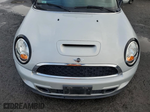 2013 MINI Convertible S with VIN WMWZP3C55DT297215, listed as a Copart auction lot 87995095 with Not provided miles and Salvage title. Bid and sale history available at DreamBid. Image 11.