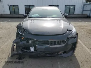 2023 Kia Stinger GT-Line with VIN KNAE35LD7P6125638, listed as a Copart auction lot 50042425 with 57,029 mi miles and Salvage Title. Bid and sale history available at carsss.com. Image 5.