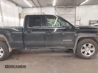 2015 GMC Sierra 1500 SLE z VIN 1GTV2UEC0FZ224982, wystawiony jako IAAI lot #42184446 z przebiegiem 183 712 mil mil oraz . Historia ofert i sprzedaży dostępna na DreamBid. Obrazek 14.