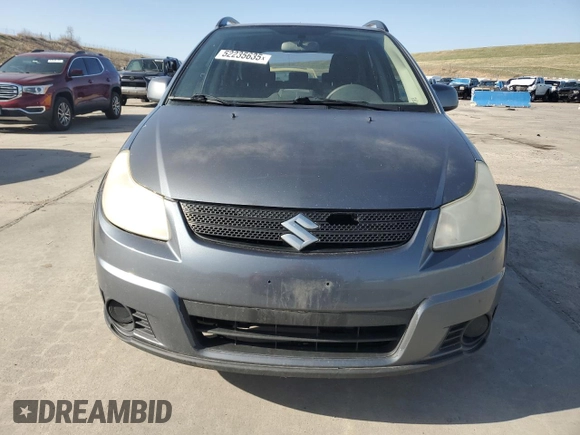 2009 Suzuki SX4 AWD z VIN JS2YB413895101919, wystawiony jako Copart lot #52235635 z przebiegiem 193 065 mil mil oraz Czysty tytuł • Clean title. Historia ofert i sprzedaży dostępna na DreamBid. Obrazek 5.