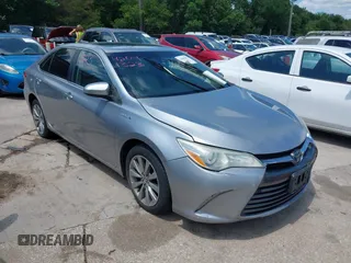 2015 Toyota Camry LE z VIN 4T1BD1FKXFU159875, wystawiony jako IAAI lot #42442875 z przebiegiem 97 545 mil mil oraz . Historia ofert i sprzedaży dostępna na DreamBid. Obrazek 1.