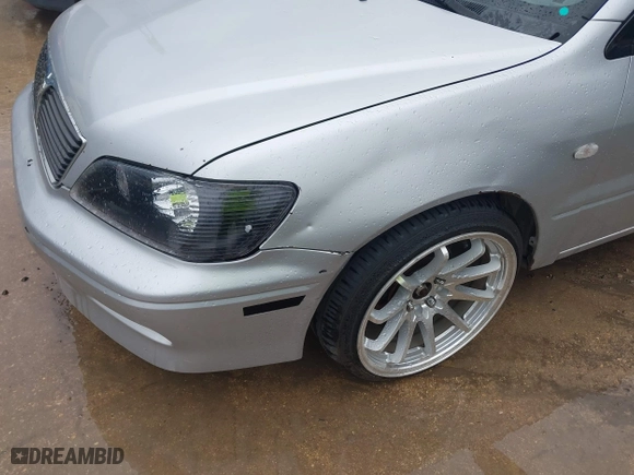 2003 Mitsubishi Lancer ES with VIN JA3AJ26E43U038813, listed as a IAAI auction lot 41778956 with 150,764 mi miles. Bid and sale history available at carsss.com. Image 6.