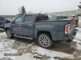 2021 GMC Canyon 4WD Denali with VIN 1GTG6EENXM1199427, listed as a Copart auction lot 86018624 with 98,520 mi miles and Salvage Title. Bid and sale history available at carsss.com. Image 2.
