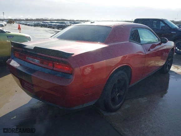 2009 Dodge Challenger SE with VIN 2B3LJ44V89H561242, listed as a IAAI auction lot 41699459 with 289,793 mi miles. Bid and sale history available at carsss.com. Image 4.