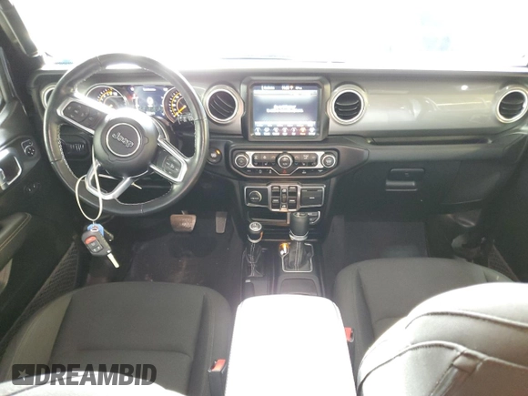 2022 Jeep Wrangler Unlimited Sahara Altitude with VIN 1C4HJXEG0NW115877, listed as a Copart auction lot 80689494 with 30,928 mi miles and Salvage title. Bid and sale history available at DreamBid. Image 8.