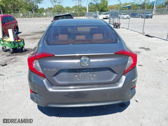 2018 Honda Civic Sedan LX with VIN 2HGFC2F56JH563682, listed as a IAAI auction lot 41779344 with 67,222 mi miles. Bid and sale history available at carsss.com. Image 16.